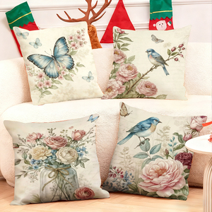 Bantal hias bermotif bunga dan burung bergaya vintage menghiasi sofa ruang tamu yang nyaman dengan kaus kaki Natal yang meriah di latar belakang. - Product Image 1