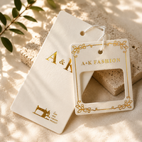 Étiquettes de vêtements de luxe personnalisées avec estampage à chaud en or, étiquettes en papier épais de qualité supérieure avec ficelle en coton pour les marques de vêtements haut de gamme