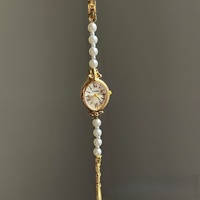 Montre à quartz pour femme, style ancien, bracelet perles, luxe léger, élégance et tempérament