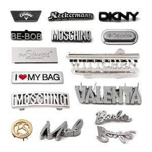 Toptan özel marka Logo giyim etiketi aksesuarları kazınmış dikiş çanta etiketleri çanta konfeksiyon Metal ISO müşteri boyutu