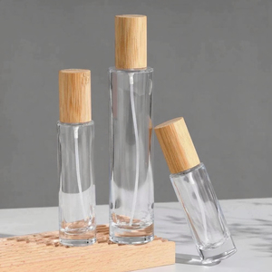 Botella de Perfume de vidrio transparente cilíndrica de alta calidad 30ml 50ml 100mL cuello de tornillo tapa de madera de bambú atomizador Uso de viaje - Product Image 1