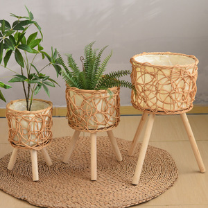 Pot de fleurs tressé avec pieds en bois, support pour plantes d'intérieur, panier en rotin pour plantes vertes, support de sol pour décoration de la maison - Product Image 1