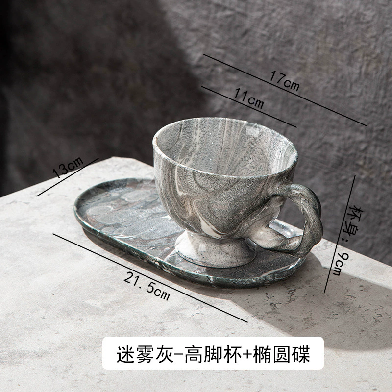 Grey cup with saucer