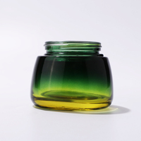 Pot en verre vide de luxe 100g vert mat avec motif plaqué et couvercles métalliques pour sérum cosmétique et crème visage