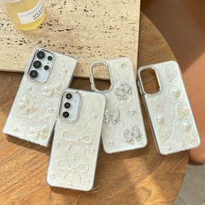 <span class=keywords><strong>Coque</strong></span> de téléphone 3D avec nœud en perles et cœur pour <span class=keywords><strong>Samsung</strong></span> S25 ultra S24 S23 A05 A16 07, design personnalisé avec paillettes époxy, vente en gros d'usine - Product Image 1