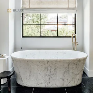 Huaxu di lusso a forma di ovale rotondo a mano bramavano in pietra naturale Free Standing vasca da bagno in marmo bianco di Carrara