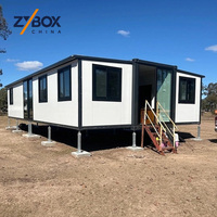 ZYBOX Maisons Modulaires Préfabriquées Auto-Nivelantes de 40 pieds, 75 m², Extensibles, Conteneurs Habillés pour l'Australie et les États-Unis, Unité de Chantier à Déplacement Rapide