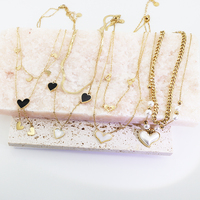 Collier en acier inoxydable tendance Byron Jewelry, vente flash, collier à double chaîne en forme de cœur blanc avec grosse perle en forme de cœur pour femmes