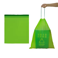 Exporteer Chinese nieuwe composteerbare groene vuilniszakken met vierkante bodem voor gebruik met meel en veevoer