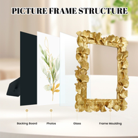 Cadre photo vintage en résine dorée orné d'un motif texturé en forme de feuille de Ginkgo, pour accrocher au mur ou poser sur table