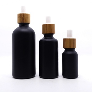 Venta al por Mayor de Botellas de Vidrio Natural de 15 ml, 1 oz, 30 ml, 100 ml, Color Azul, Verde, Ámbar, Negro, Transparente, Esmerilado, con Gotero y Tapa de Bambú - Product Image 3