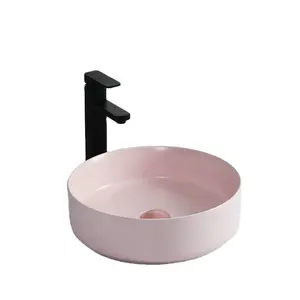 中国浴室盆厂家直销陶瓷椭圆形脸盆台面水槽粉色脸盆浴室水槽