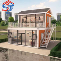 Casa Contenedor Prefabricada de Lujo de Dos Pisos con Paneles Sándwich, Techo Inclinado, Paredes de Vidrio, Diseño Moderno y Montaje Rápido para Hotel