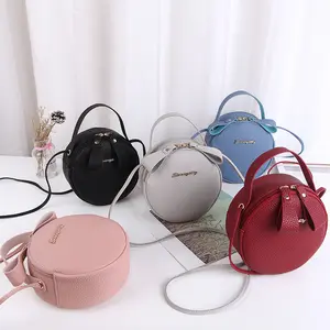 Trendy promotion cheap gift leather pu small round clutch bag women sling shoulder slung ladies chain strap phone bag