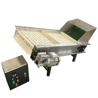 Transportador de cinta modular con deflector para transportar cubitos de hielo Filtrado automático de escoria de hielo y transportador de material de elevación