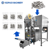 Machine automatique de remplissage, scellage, emballage et conditionnement à 2 bacs pour kits de quincaillerie, vis, boulons, attaches et pièces métalliques, avec isolation phonique