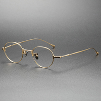 Lunettes optiques en titane pur, montures de lunettes de vue ovales unisexes tendance, vente en gros de lunettes pour hommes et femmes