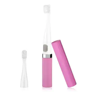 粉色旅行电动牙刷，带2个刷头2个模式防水声波牙刷，电池供电便携式迷你设计