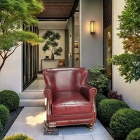 Fauteuil en cuir de vachette noir et blanc de style européen, cuir véritable, structure en bois massif, fauteuil luxueux à une place, mobilier d'intérieur, chaise confortable