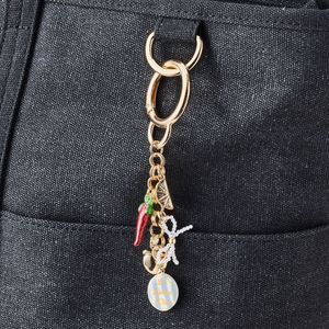 TG-2687 Novedad 2025 Elegante Llavero de Pulsera con Cuentas DIY Colgante de Tela a Juego para Bolso - Product Image 4