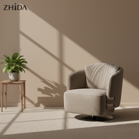 Fauteuil moderne gris à accents, canapé individuel confortable avec base métallique rotative et revêtement en coton pour salon et chambre