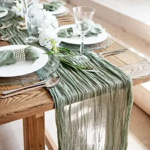 ダイニングテーブルの装飾素朴な自由奔放に生きるビーチ結婚披露宴の装飾チーズクロステーブルランナー