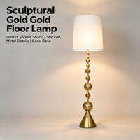 Lampadaire sculptural doré à abat-jour cylindrique blanc, base conique à tiges empilées, lampe sur pied moderne pour salon et hôtel