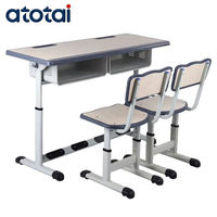 Table et chaise d'étude pour étudiants en métal au design moderne avec hauteur réglable, plateau en bois confortable pour une utilisation en classe ou à l'école