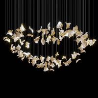 Firelux développe une escalier luxueux haut de gamme pour hôtel, villa, salon, avec un lustre en forme de fleurs dorées et blanches