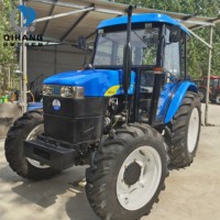 Trattore Agricolo Usato New Holland SNH 704 con Cabina di Guida, 70 CV, 4x4, con Caricatore Frontale