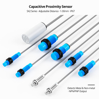 Sensor Jarak Kapasitif 10-30vdc Ip67 Sakelar Jarak Bersertifikasi Ce Output Npn/pnp Jarak Penginderaan 1-30mm Terproteksi