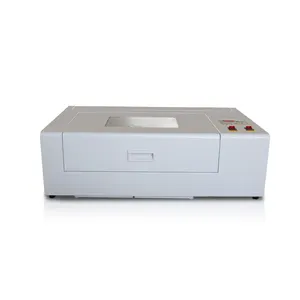 Penjualan Terbaik Mini Desktop Portabel 3020 40W 50W CO2 Laser Cutter Mesin Pengukir Laser Industri Harga untuk Kayu Bukan Logam