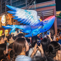 Modèle d'animal suspendu gonflable coloré personnalisé perroquet gonflable avec lumières LED ballon décoratif de défilé d'oiseaux gonflable volant