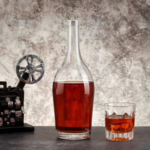 Botella de <span class=keywords><strong>Licor</strong></span> Redonda de Vidrio Transparente de 1000 ml con Sellado de Corcho, para Vodka, Whisky, Tequila, Ginebra, <span class=keywords><strong>Ron</strong></span>, Brandy, Venta al por Mayor - Product Image 1