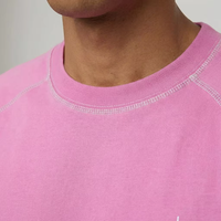 Ensemble de sport 2 pièces pour homme en coton respirant rose uni avec surpiqûres contrastées, coupe ample, short et t-shirt, vente en gros