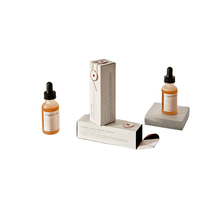 Boîte-cadeau de parfum de bouteille d'huile essentielle conçue sur mesure emballage cosmétique laminé mat rigide pour ensemble d'impression gaufré de perruques