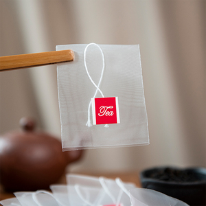 Oem Tự Làm Tốt Nhất Con Dấu Nhiệt Phân Hủy Sinh Học Phân Hủy Sinh Học Nylon Lưới Lụa Rỗng Kim Tự Tháp Tam Giác Túi Trà Với Chuỗi - Product Image 2