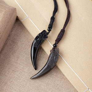 Pendentif en <span class=keywords><strong>obsidienne</strong></span> <span class=keywords><strong>noire</strong></span> naturelle en forme de dent de loup, sculpté à la main, amulette en cristal pour la <span class=keywords><strong>protection</strong></span>, vente en gros - Product Image 4