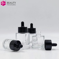 Clair 10ml 15ml 30ml 40ml 50ml rond cosmétique visage cheveux verre sérum pompe huile essentielle flacon compte-gouttes avec bouchon noir