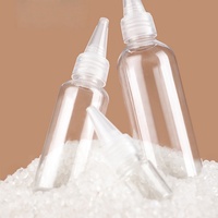 Bouteille d'huile capillaire en plastique PET transparent haut de gamme de Chine avec bouchon à bec coloré et embout compressible