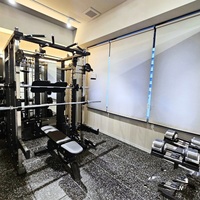 Vente chaude Smart Home Gym Gym Accessoires de sport Équipement de fitness en ligne Maquina Smith Trainer Support de squat mural