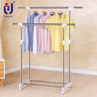 Porte-vêtements suspendu en métal à double niveau professionnel Standard cintre à double pôle rotatif conception détachable pour les salles de bain