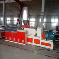Ligne de production d'extrusion de cadres de porte en WPC d'occasion, machine de fabrication de profilés hautement automatisée avec système à double vis