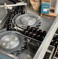 Machine de lavage verticale à ultrasons pour flacons, équipement automatique de nettoyage de bouteilles en verre avec contrôle PLC pour un fonctionnement stable