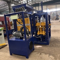 Machine à blocs de ciment entièrement automatique QT4-15B, ligne de fabrication de briques en béton avec une structure durable et un entretien facile