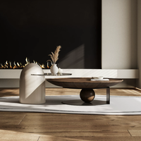 Ensemble de table basse ronde en bois noir courbé de style Japandi avec structure en métal pour salon et maison