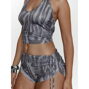 ชุดออกกำลังกายลายม้าลายสำหรับผู้หญิง รุ่นคัสตอม 2026 เสื้อกล้ามแบบผูกคอ กางเกงขาสั้น แห้งเร็ว ผูกเชือก ชุดออกกำลังกาย ผ้าเมมโมรี่ - Product Image 1