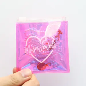 Luxe Petit 6x6cm rose pvc holographique en plastique sac à fermeture éclair avec logo blanc pour bijoux accessoires emballage pochette zippée