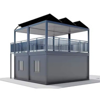Maison préfabriquée modulaire à ossature en acier à deux étages, alimentée à l'énergie solaire, avec façade en verre, terrasse, design moderne