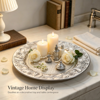 Assiette de présentation en plastique PP, décorée de motifs floraux vintage en relief, avec revêtement argenté en poudre, pour banquets, mariages et décorations de table de fêtes.